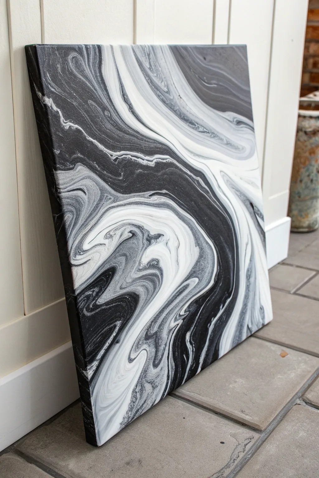Glossy black and white marble swirl abstract painting, minimalist Scandinavian with a hint of boho