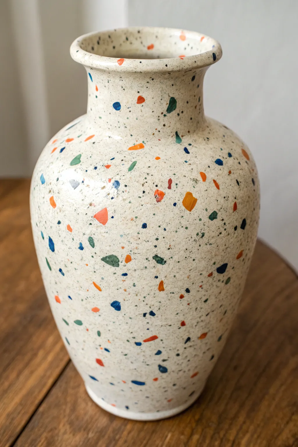 Terrazzo speckles transform a simple ceramic vase into a bold, modern statement piece.