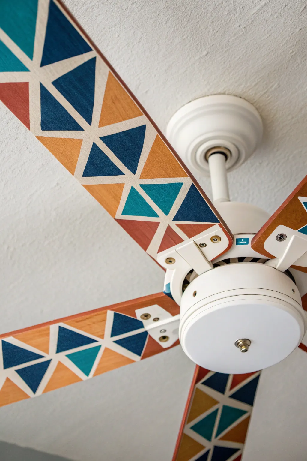 Geometric color-block fan blades: crisp when still, dreamy motion blur when spinning in bold hues