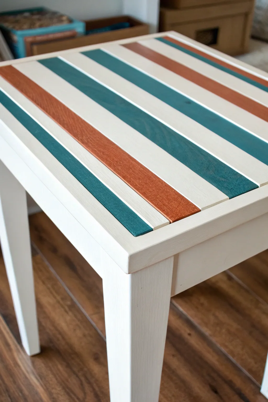 Crisp painted stripes turn a simple end table into a bold, handcrafted statement piece.