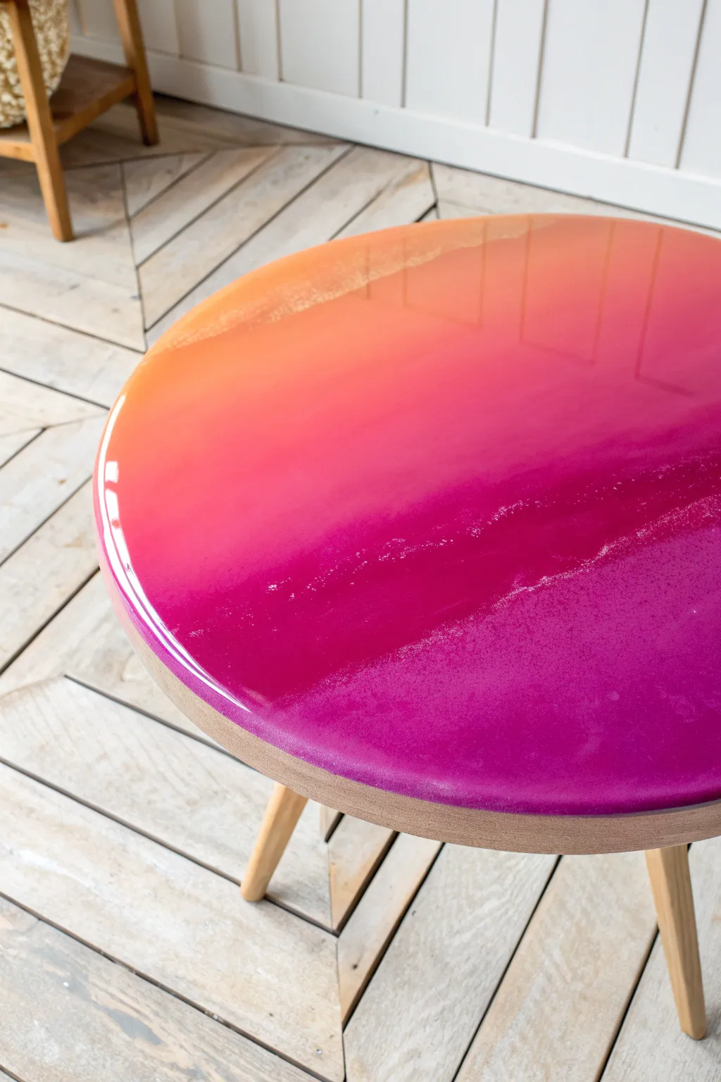 Sunset ombre resin tabletop with glossy depth, glowing peach-to-violet gradient in clean light