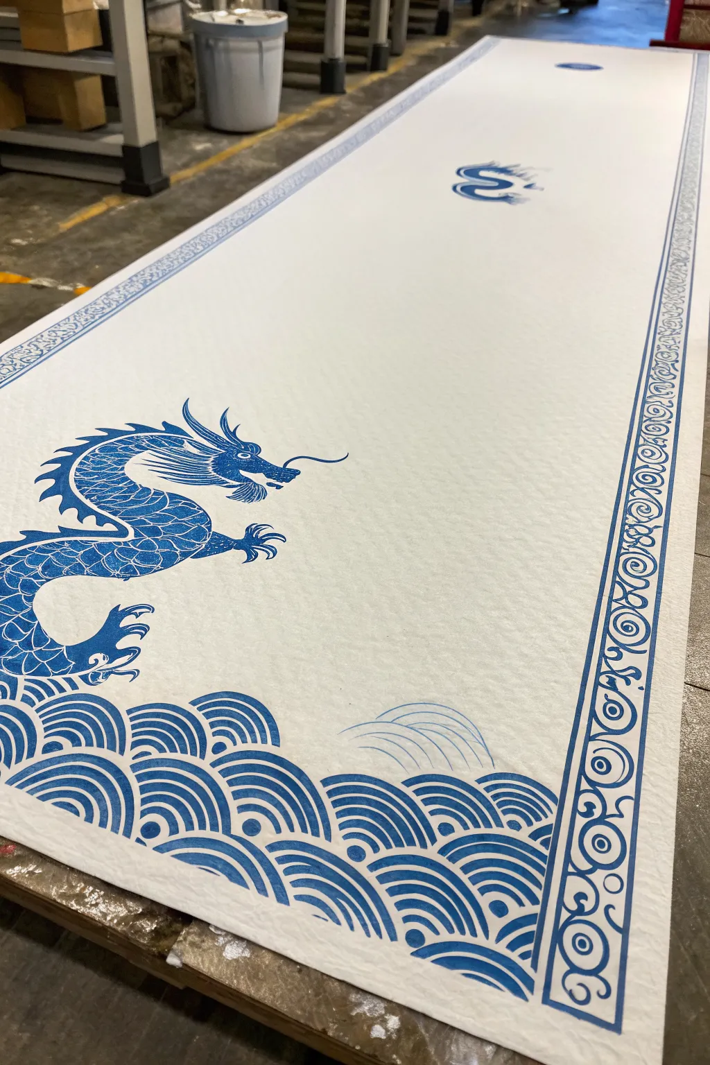 Crisp cobalt dragon on bright white negative space for a bold, minimalist blue-and-white look