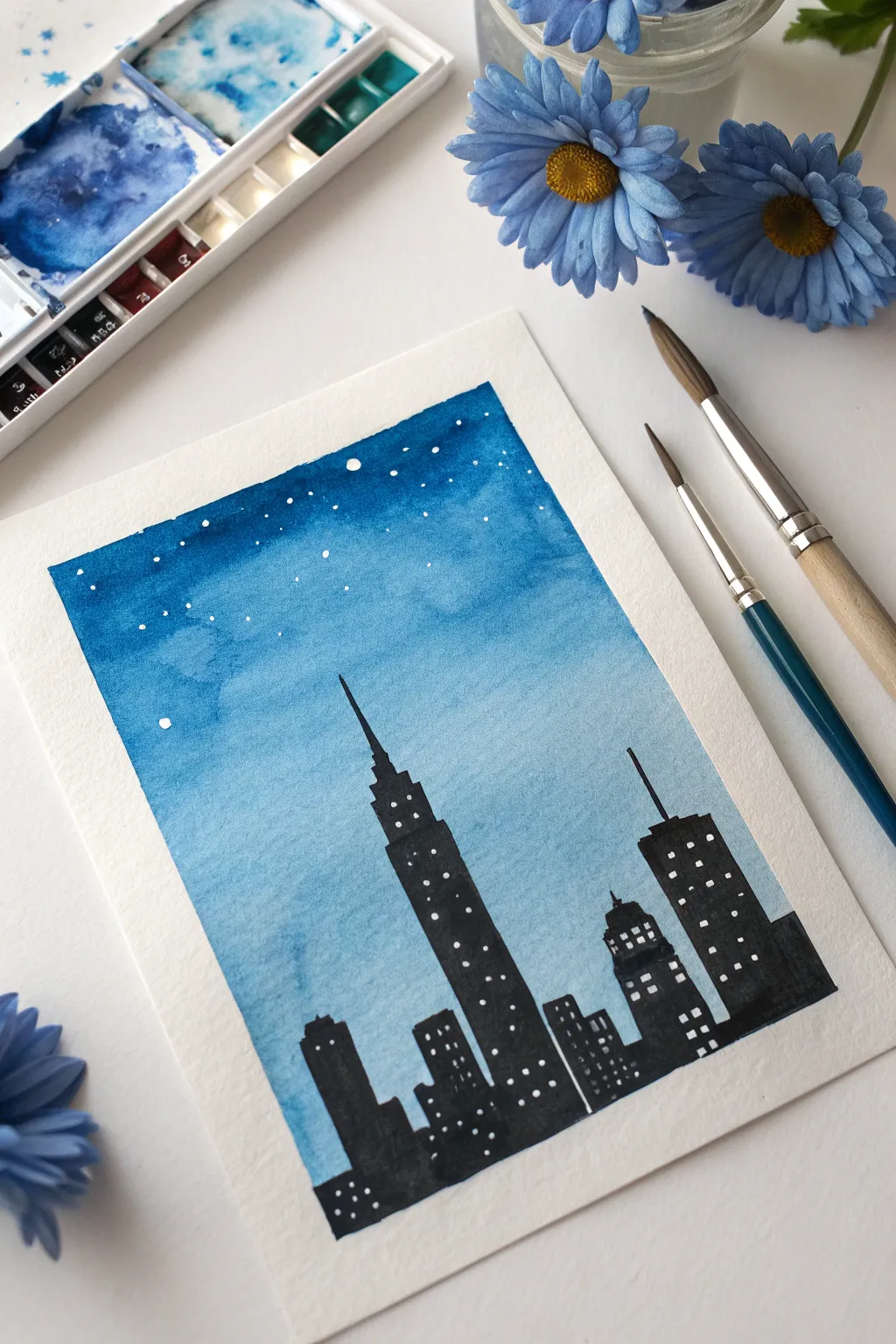 Simple blue ink wash skyline with bold contrast and soft gradients, perfect for beginner painting