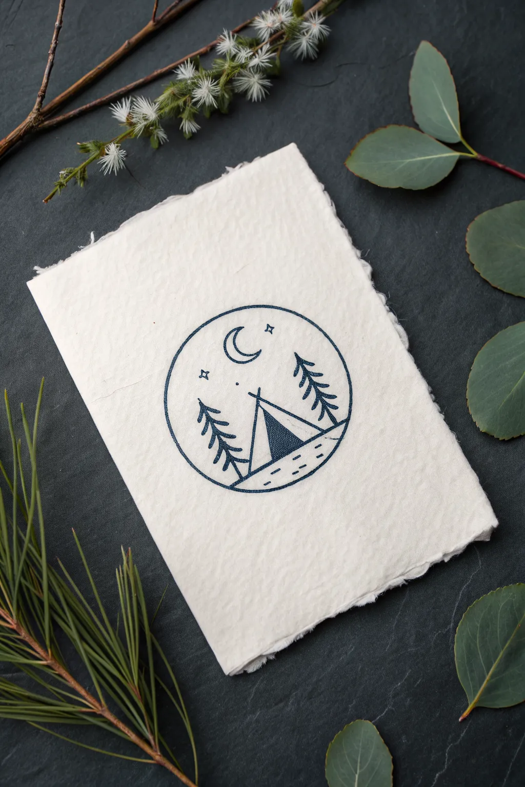 Easy micro landscape in a circle: pine tree, tent, and moon in a clean minimalist outline.