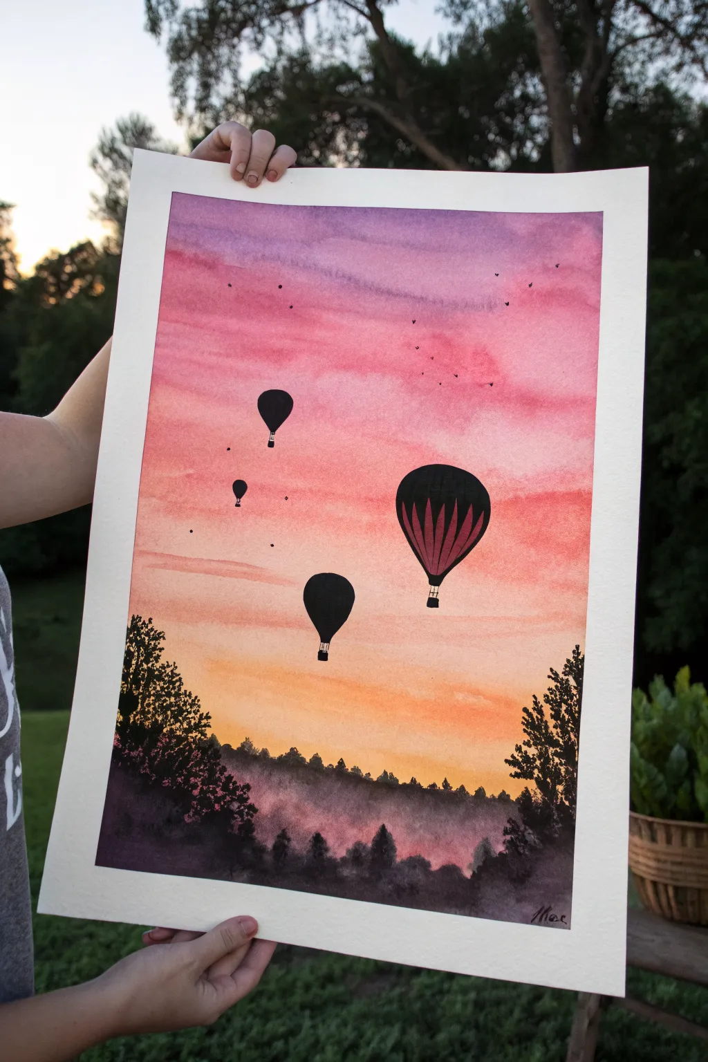 Hot air balloon silhouettes on a sunset gradient, a dreamy easy painting idea for beginners