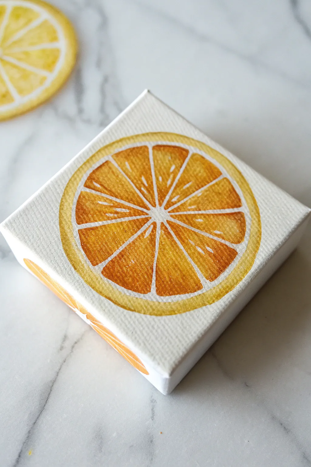 Simple citrus slice mini canvas idea with bold color, clean segments, and a crisp white ring