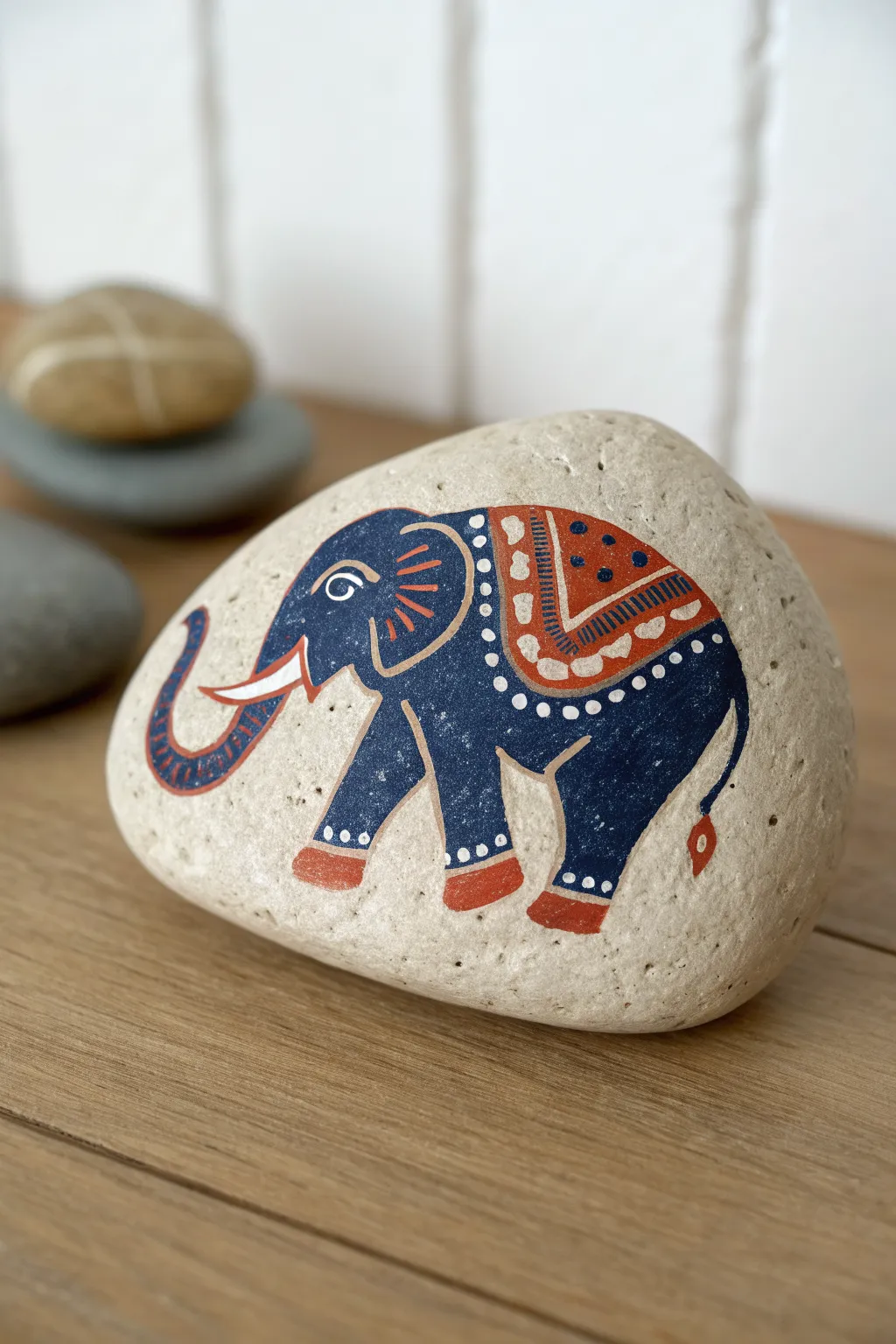 Turn a curved stone hump into an elephant back with simple shapes and bold boho color.