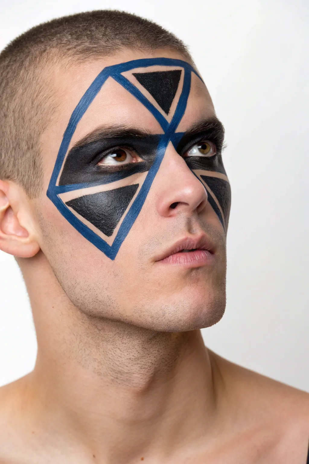 Minimal geometric eye mask for men with crisp triangles, bold contrast, and clean negative space