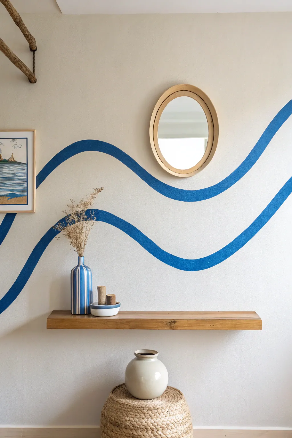 Bold wavy paint band on a calm neutral wall for an easy Scandinavian-boho accent.