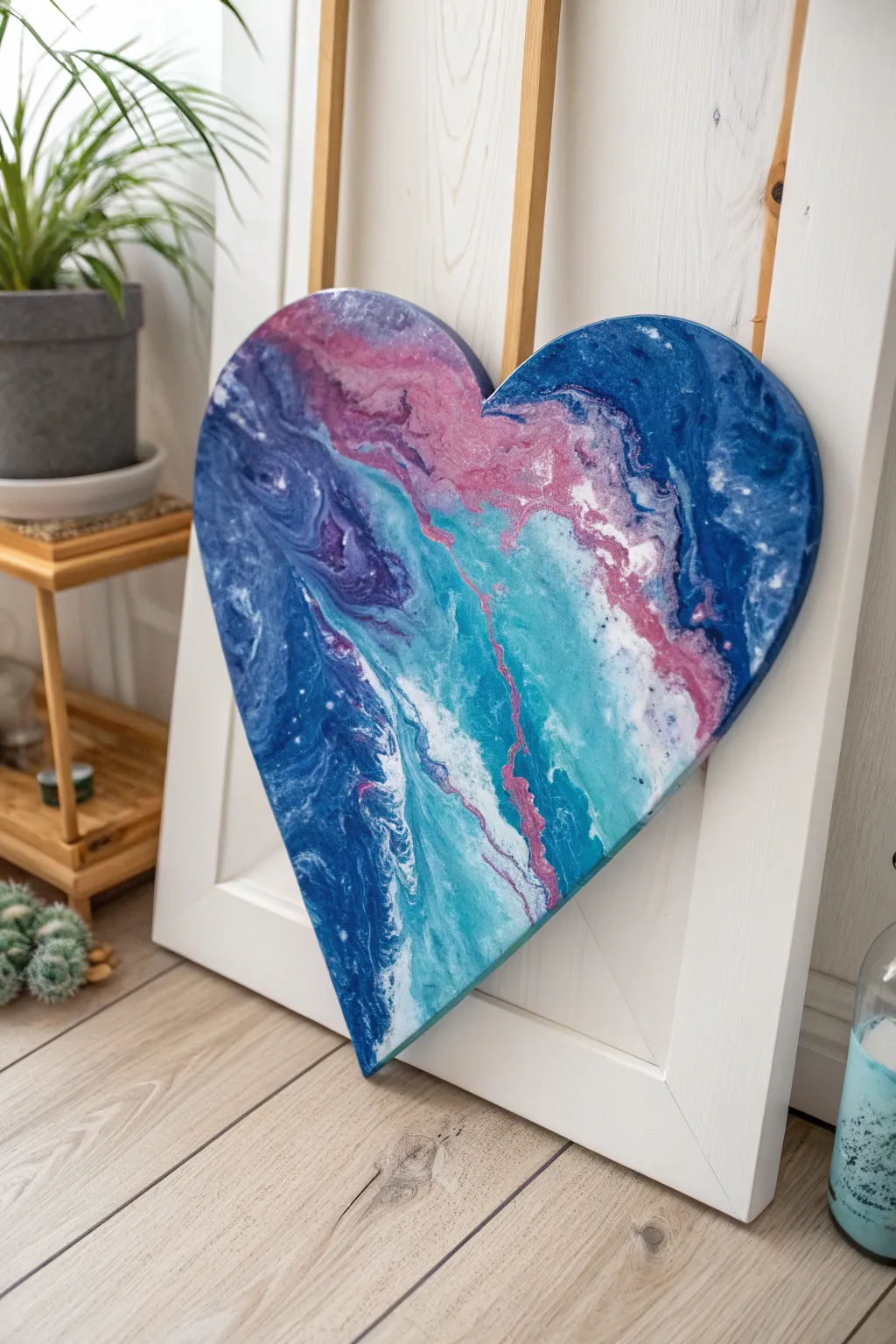 Cling-wrap marble heart canvas in bold colors, dramatic veins and blooms with an easy DIY feel