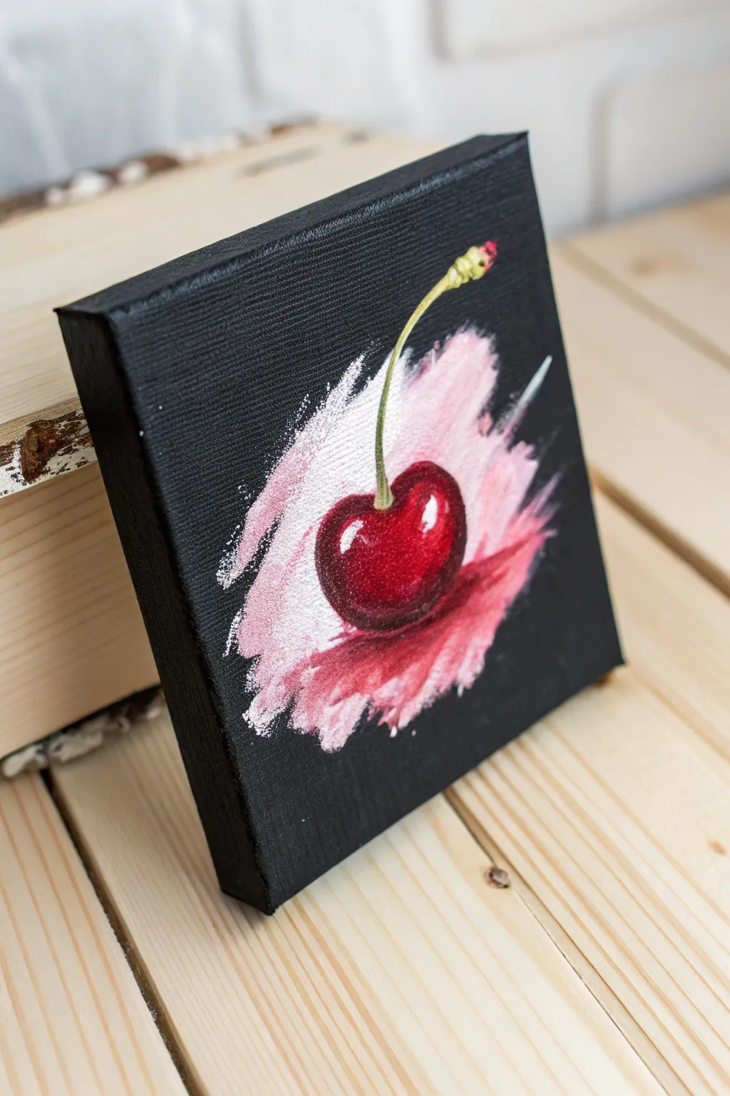 Mini black canvas cherry splash with bold red pop and soft blush splash for minimalist boho vibes.