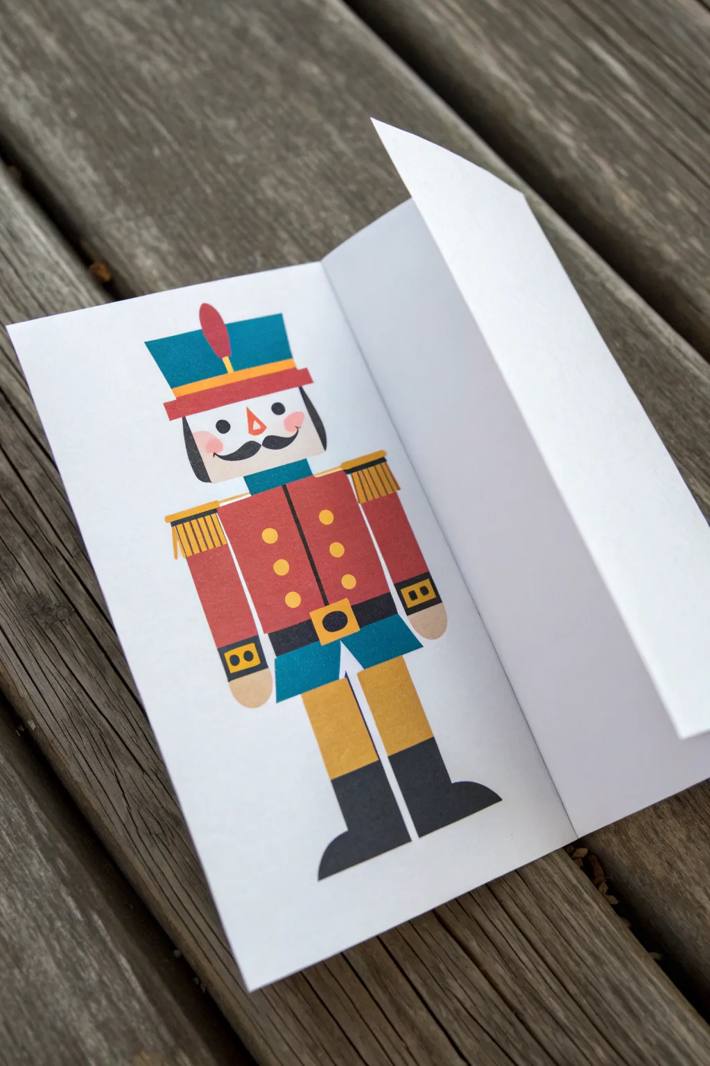 Fold-out nutcracker drawing with a hinged jaw flap, bold colors, minimal lines, and cozy craft vibes
