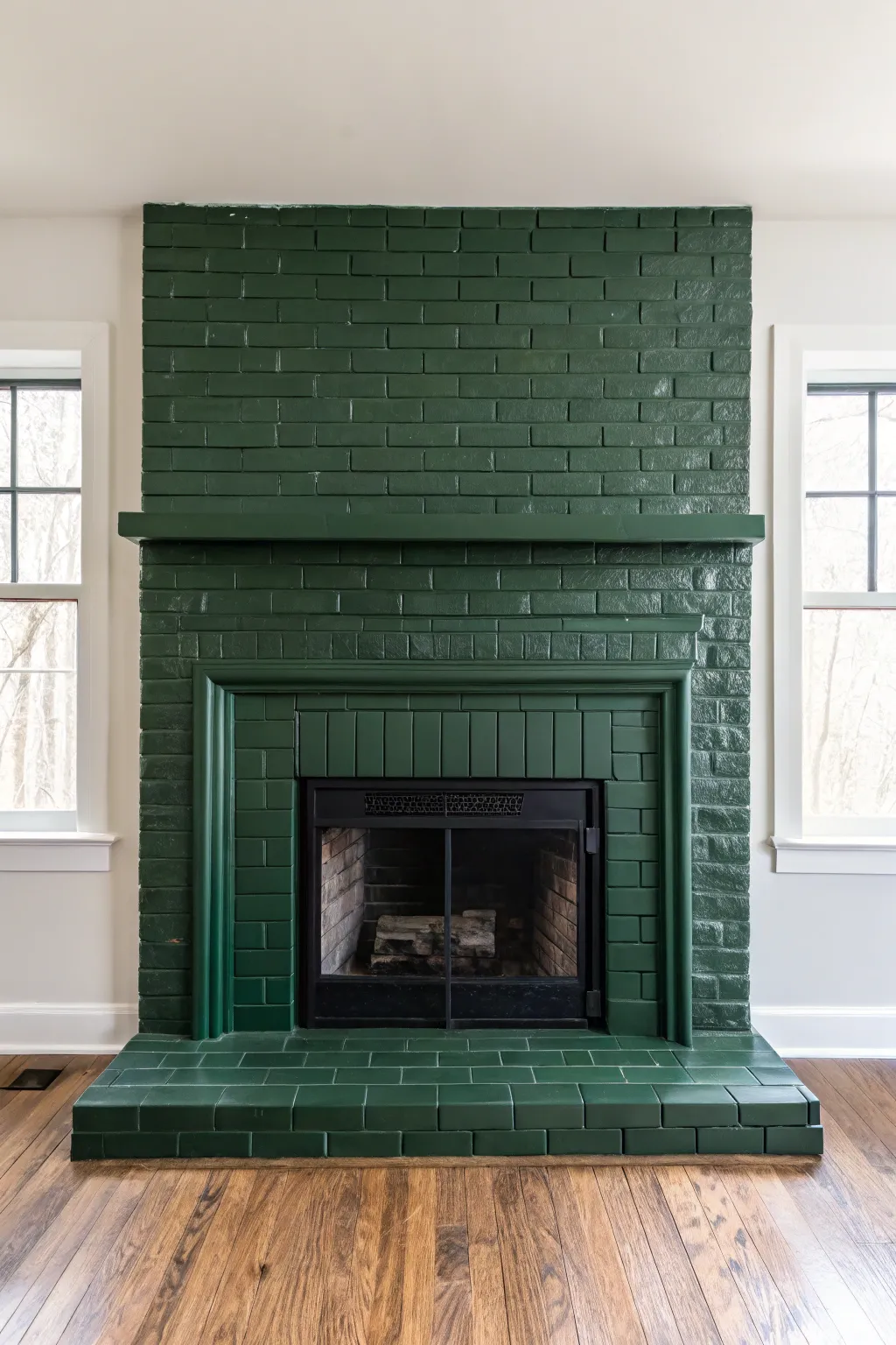 High-gloss painted brick brings a sleek, modern twist and a luminous sheen to your fireplace.