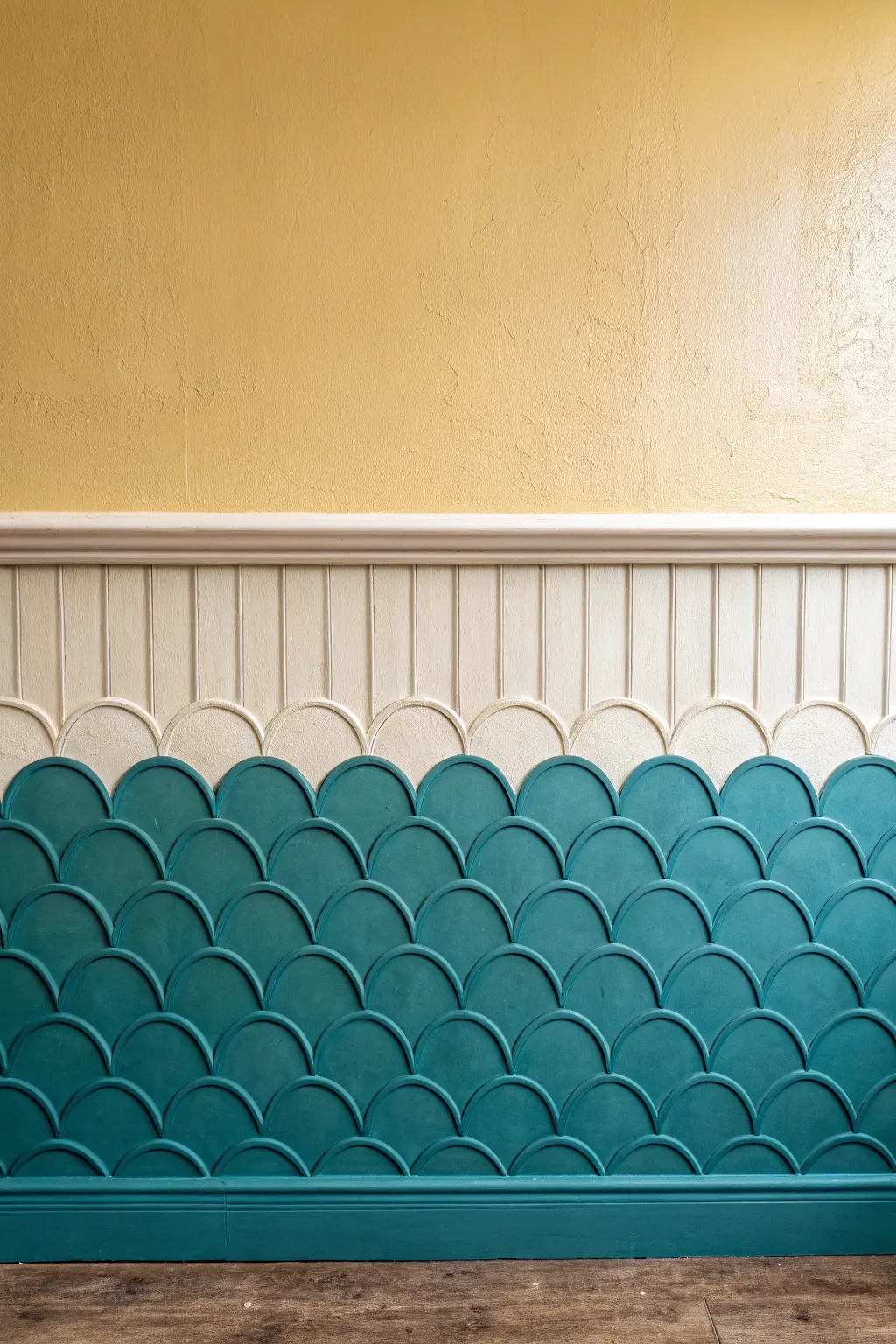 Scalloped border transition that neatly bridges two bold wall colors with a cheerful graphic curve