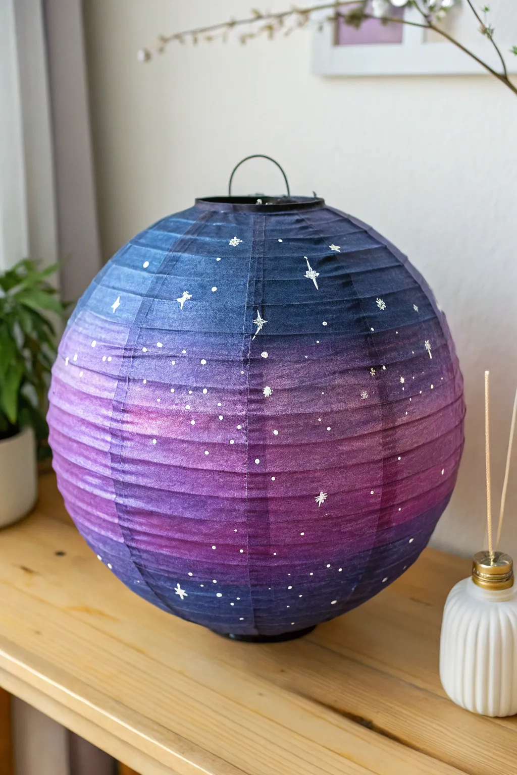 Moody galaxy gradient paper lantern with starry splatter for minimalist boho painting inspo