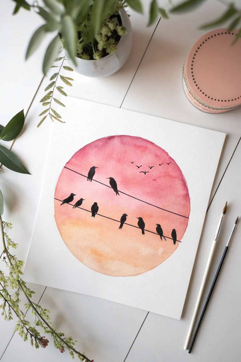 Capture simplicity with this birds on a wire circle painting. A perfect minimalist DIY project.