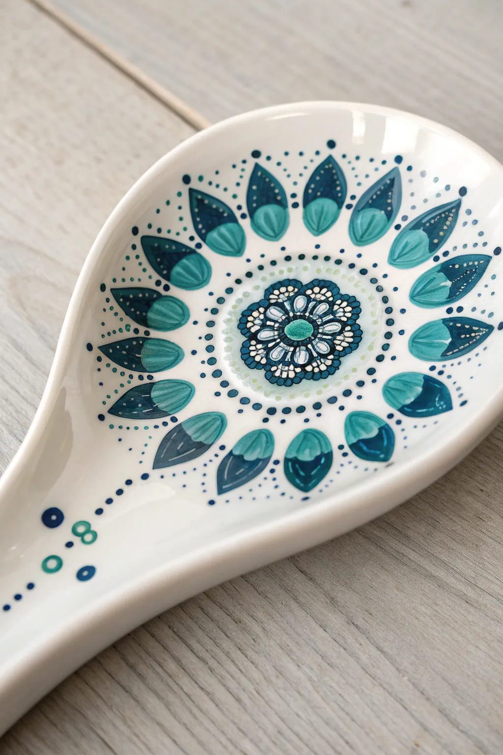 Find your zen with this mesmerizing teal dot mandala spoon rest design.