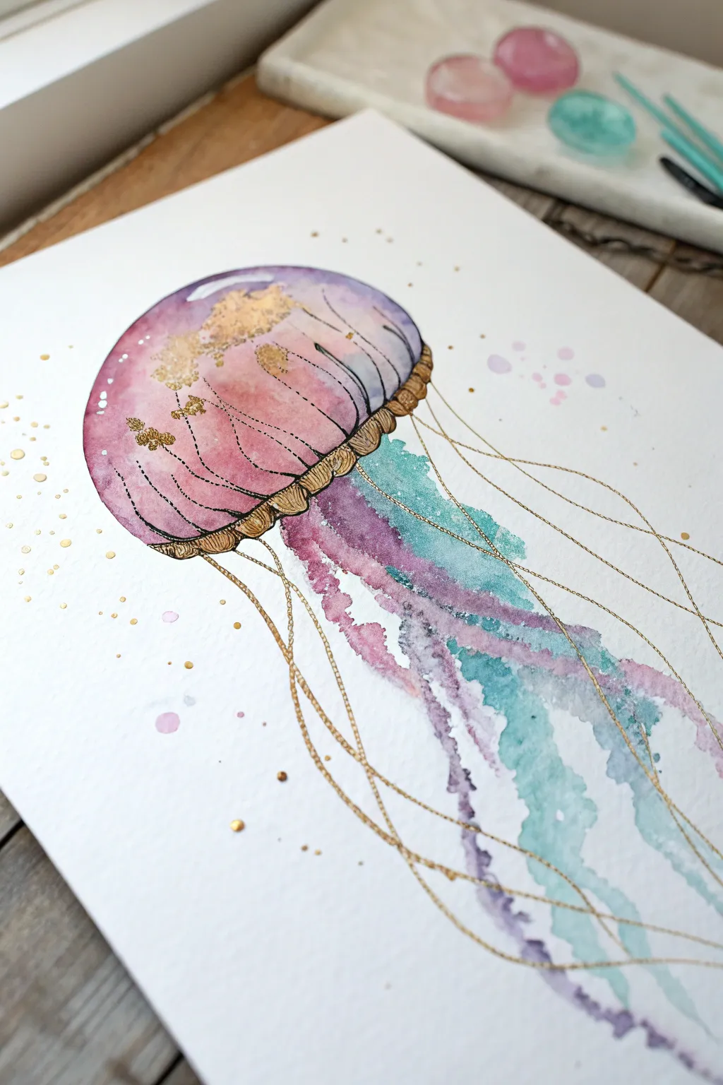 Dreamy alcohol ink orb with delicate dripping trails, minimalist boho on bright white paper