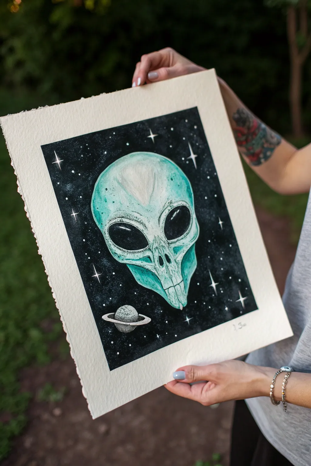 Glowing alien skull x-ray painting idea with minimalist contrast and a dark, star-speckled void