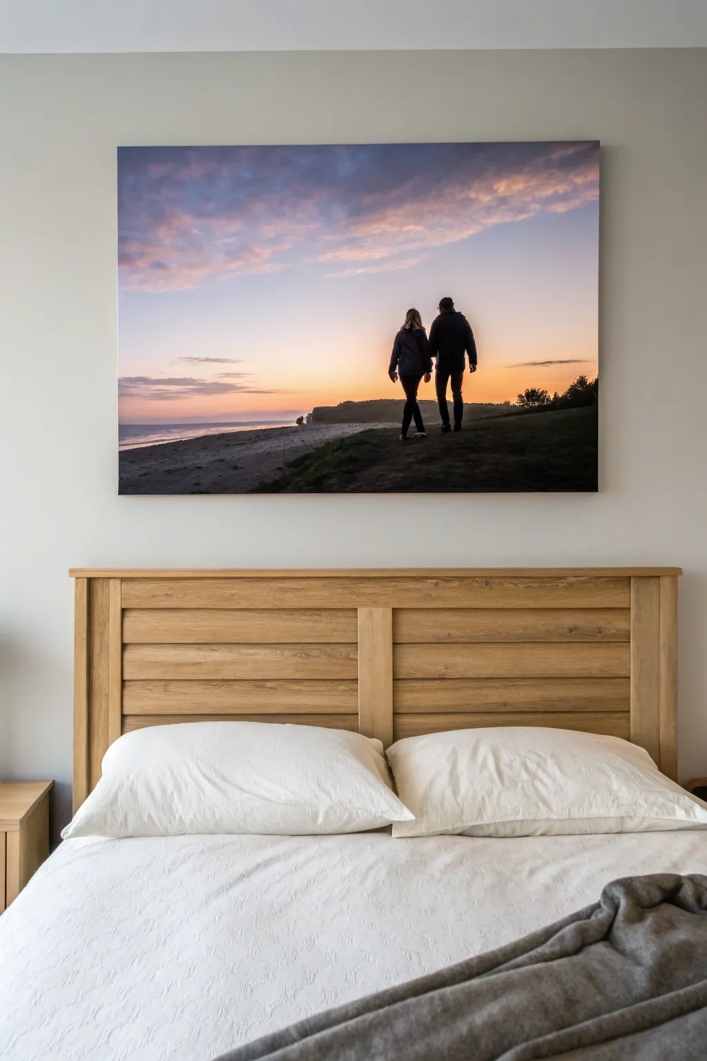 Minimal dusk silhouette canvas above the bed, calm Nordic lines with a gentle boho warmth.