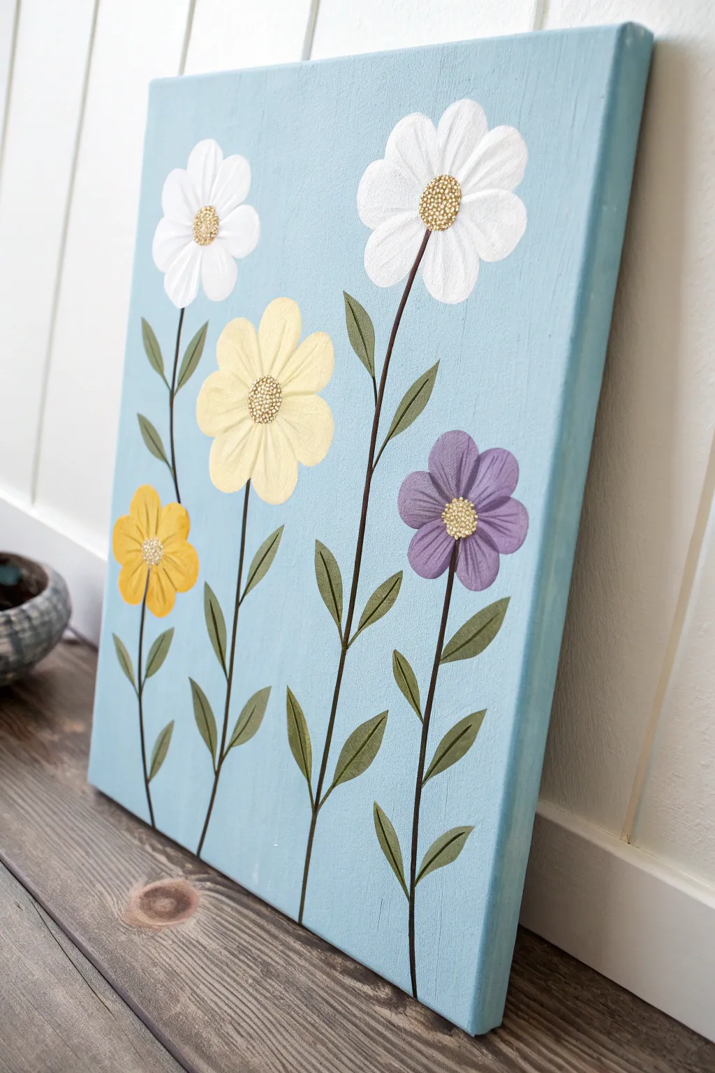 Sunny simple blooms on a sky-blue canvas, a fresh minimalist flower painting idea