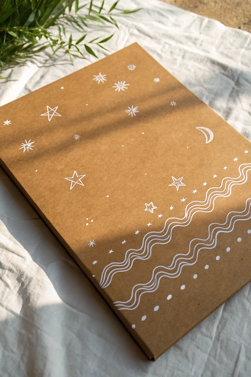 Minimal white highlights on kraft cardboard for a warm, high-contrast Scandinavian look