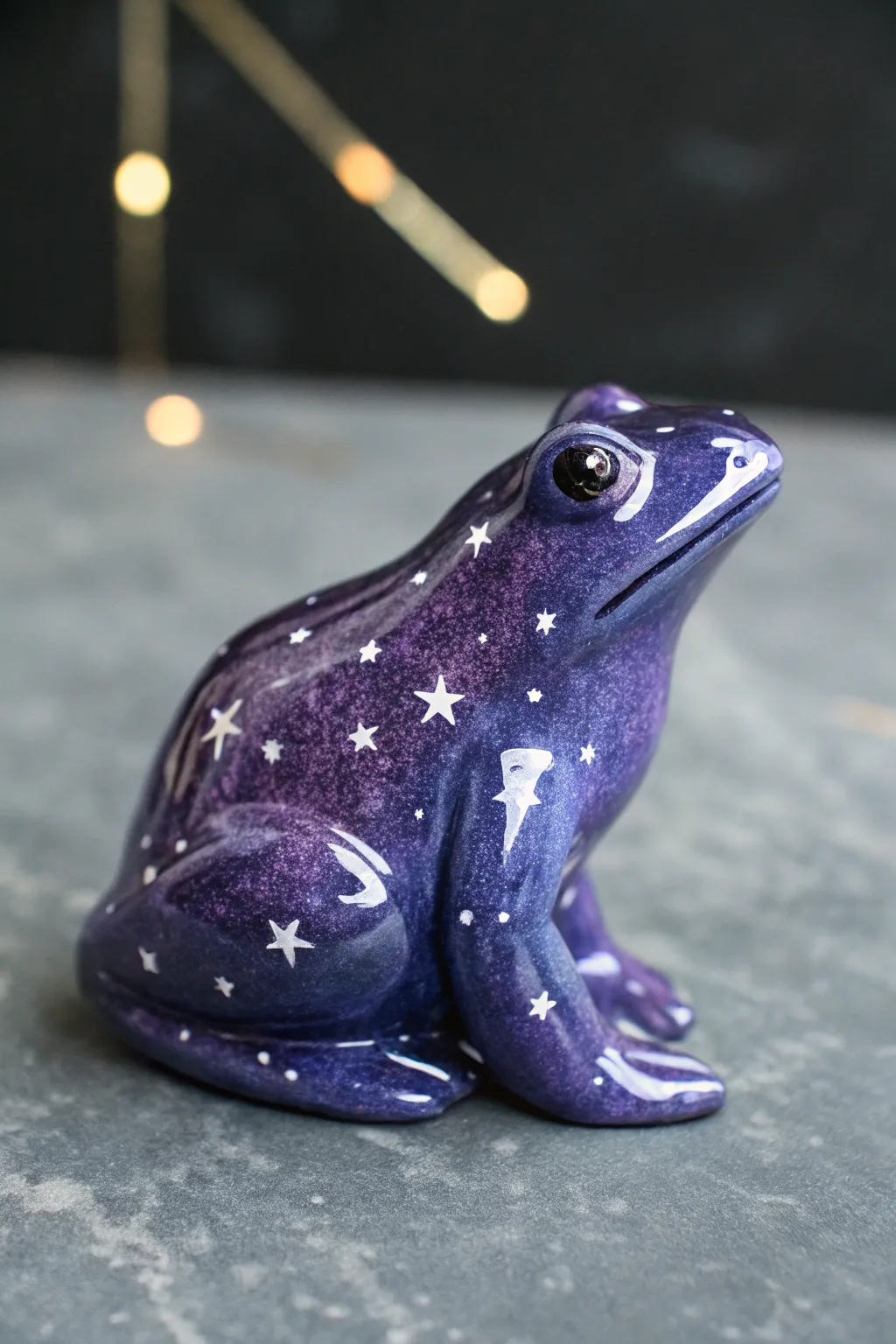 Galaxy frog ceramic in navy and purple, dusted with star speckles for a dreamy night-sky vibe.