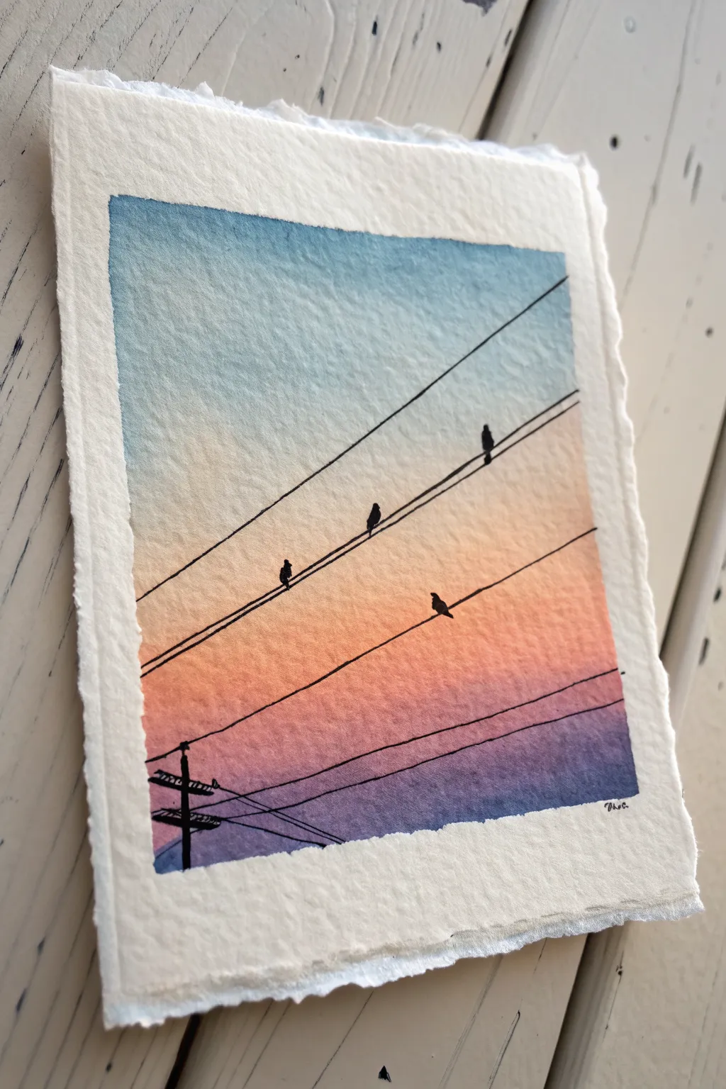 Soft dusk gradient with tiny birds on power lines, a cute and easy oil pastel drawing idea.