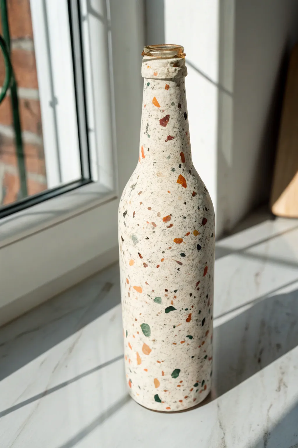 Terrazzo speckle bottle paint idea for a minimalist, modern texture with boho charm