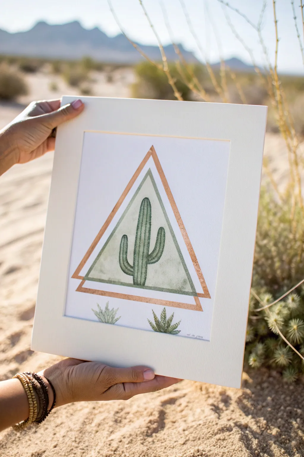 Minimal geometric cactus in a triangle frame, soft boho hues and clean Scandinavian contrast