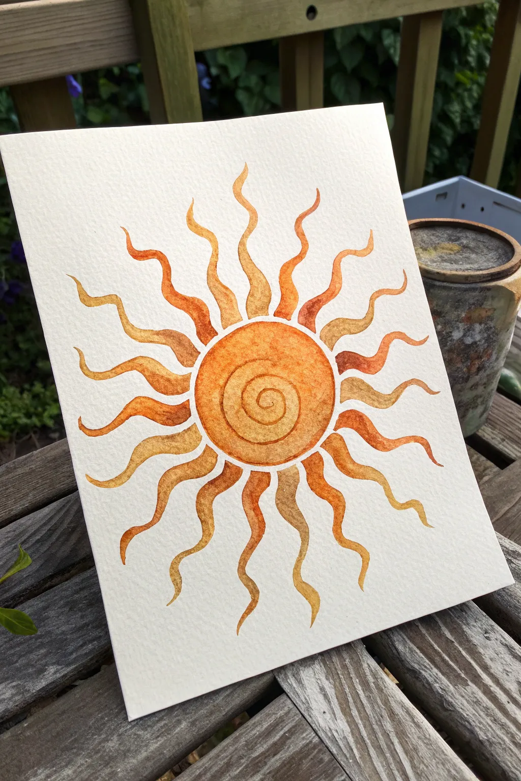 Playful swirly sun rays in warm hues—an easy minimalist painting idea with boho charm.