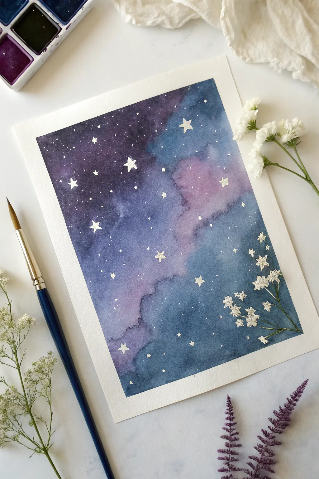 Night sky galaxy wash with splattered stars, a dreamy watercolor painting idea to copy