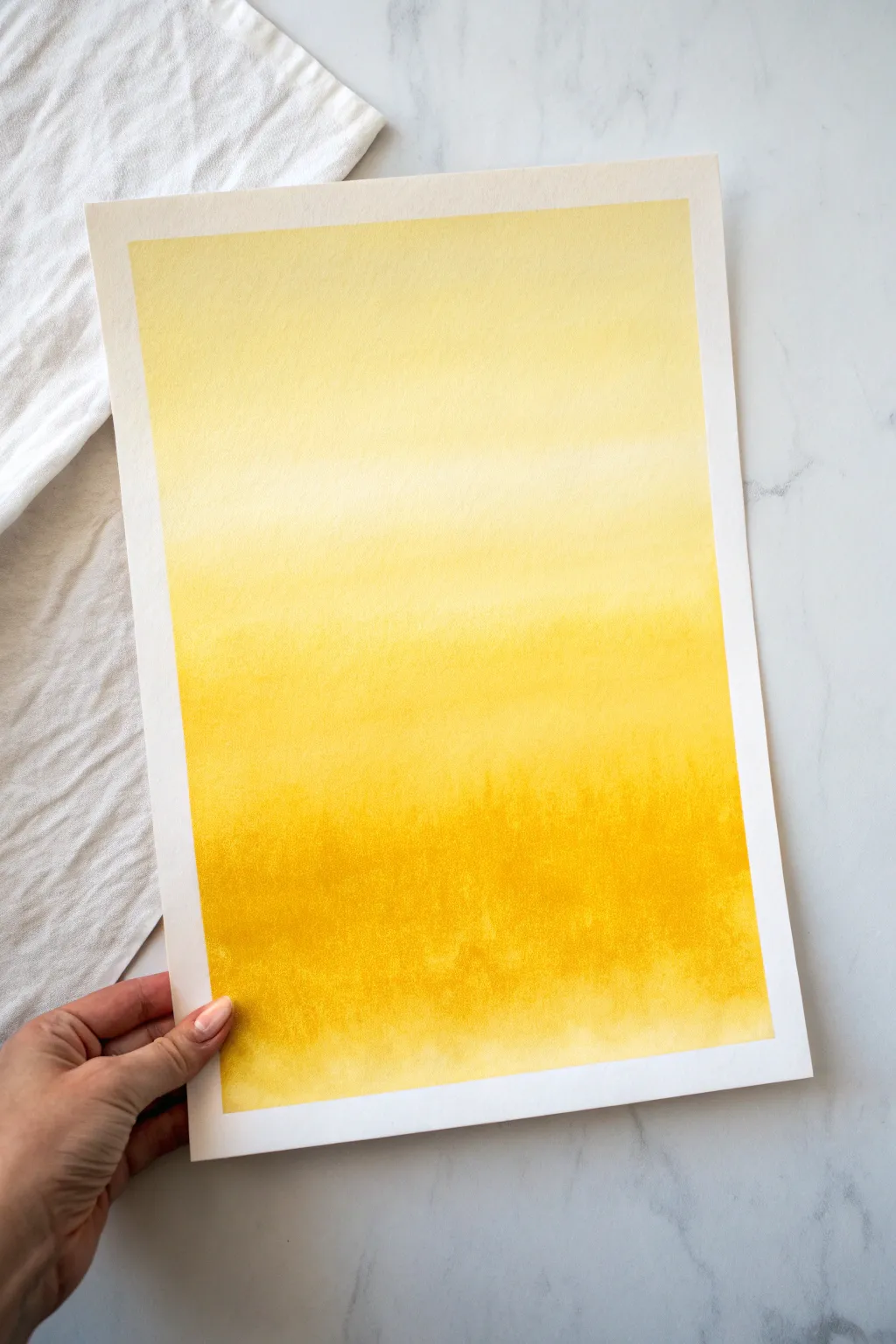 Soft to bold: a hand-painted monochrome yellow ombré that glows with minimalist warmth.