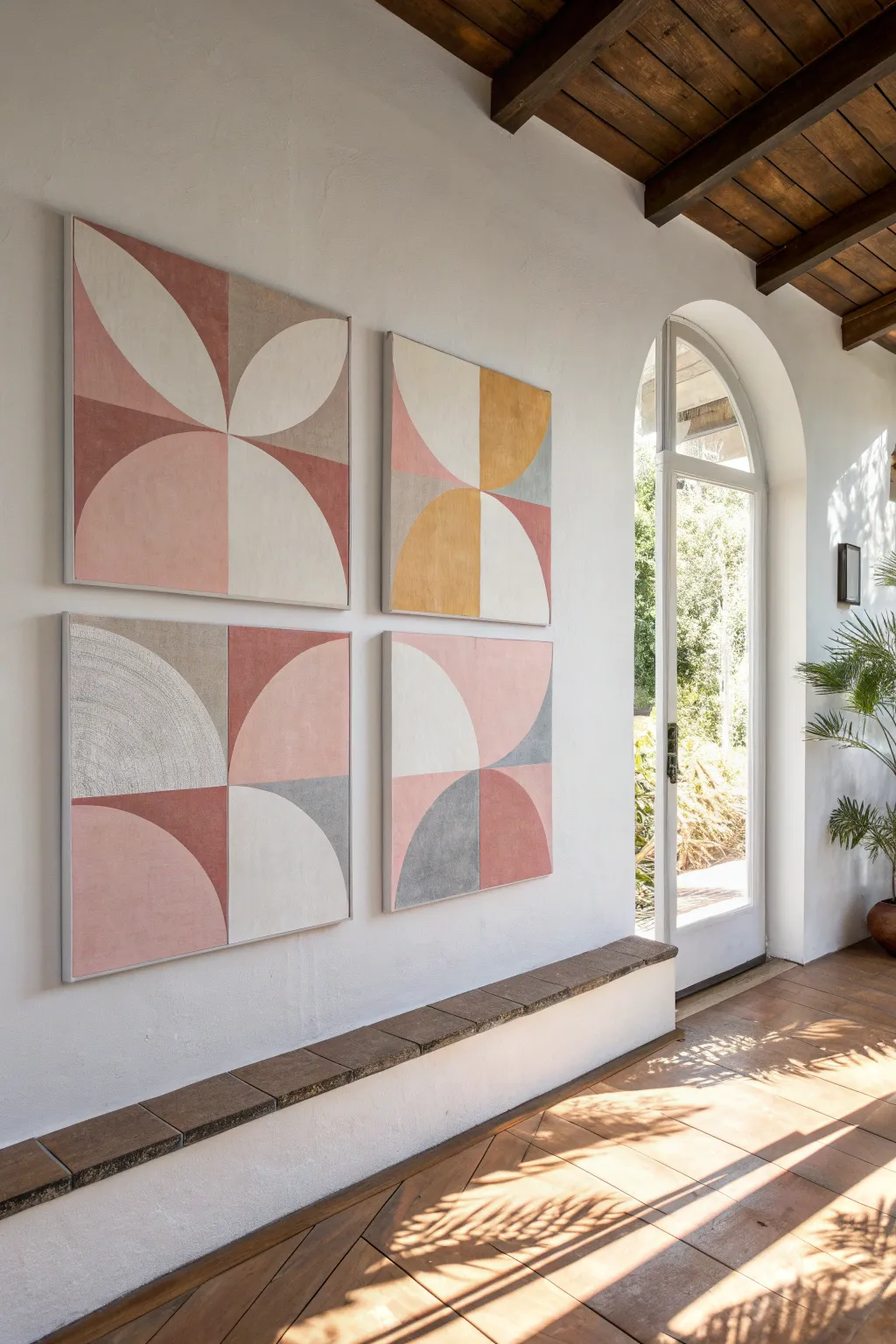 Modern blush and gray geometric canvases for a sweet baby girl nursery, clean and cozy.