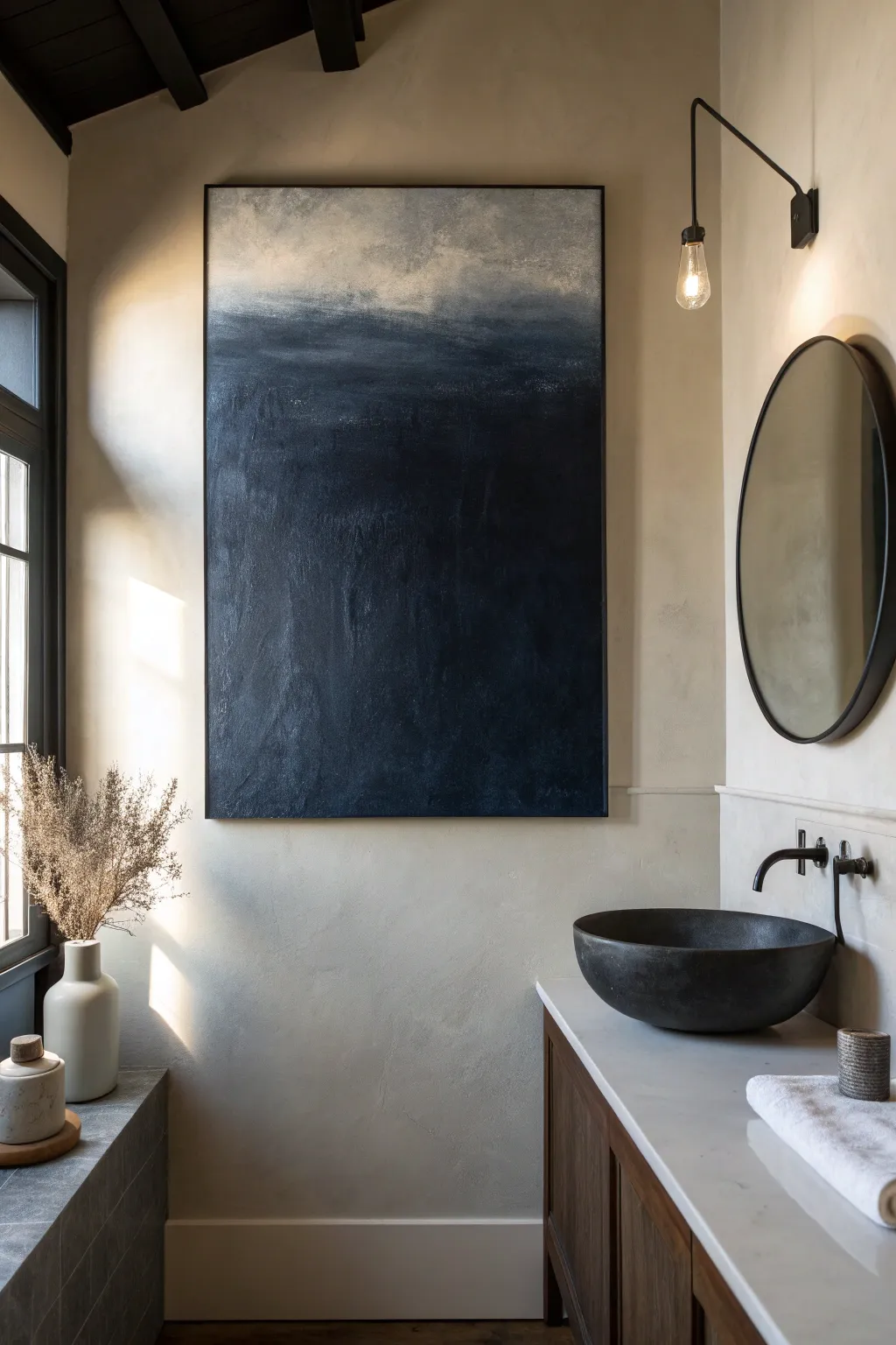 Moody monochrome canvas wash that adds cozy drama to a minimalist half bath