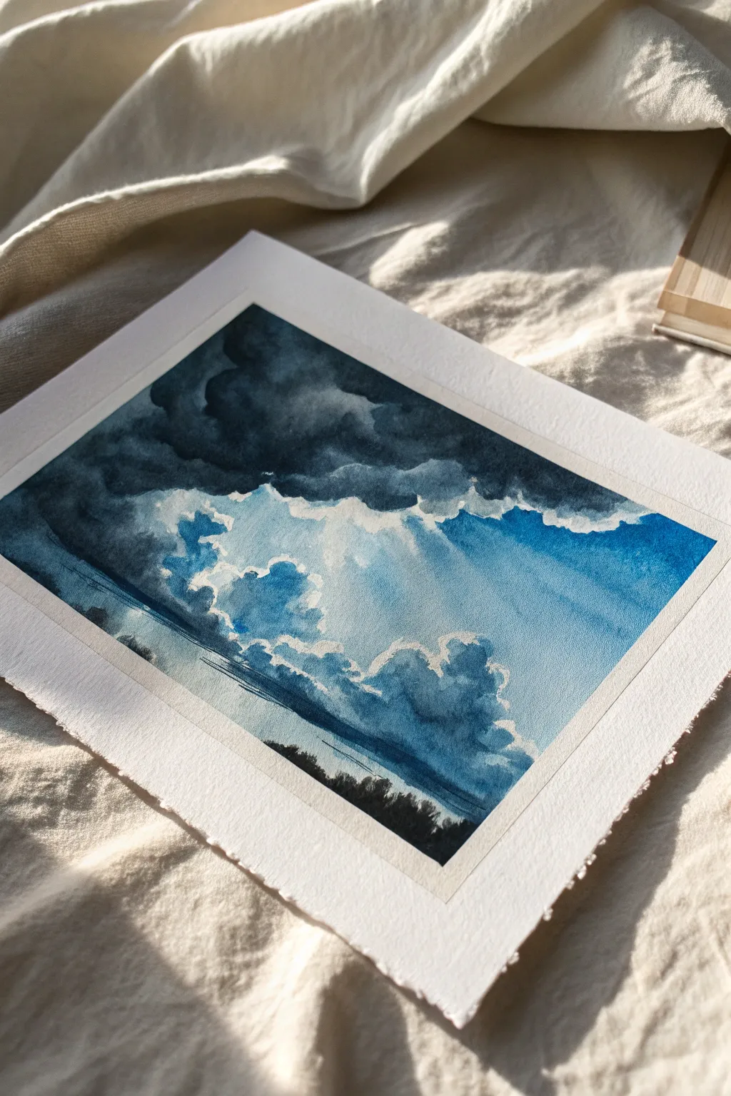 Storm clouds part to reveal crisp blue patches, a calming high-contrast sky study to paint