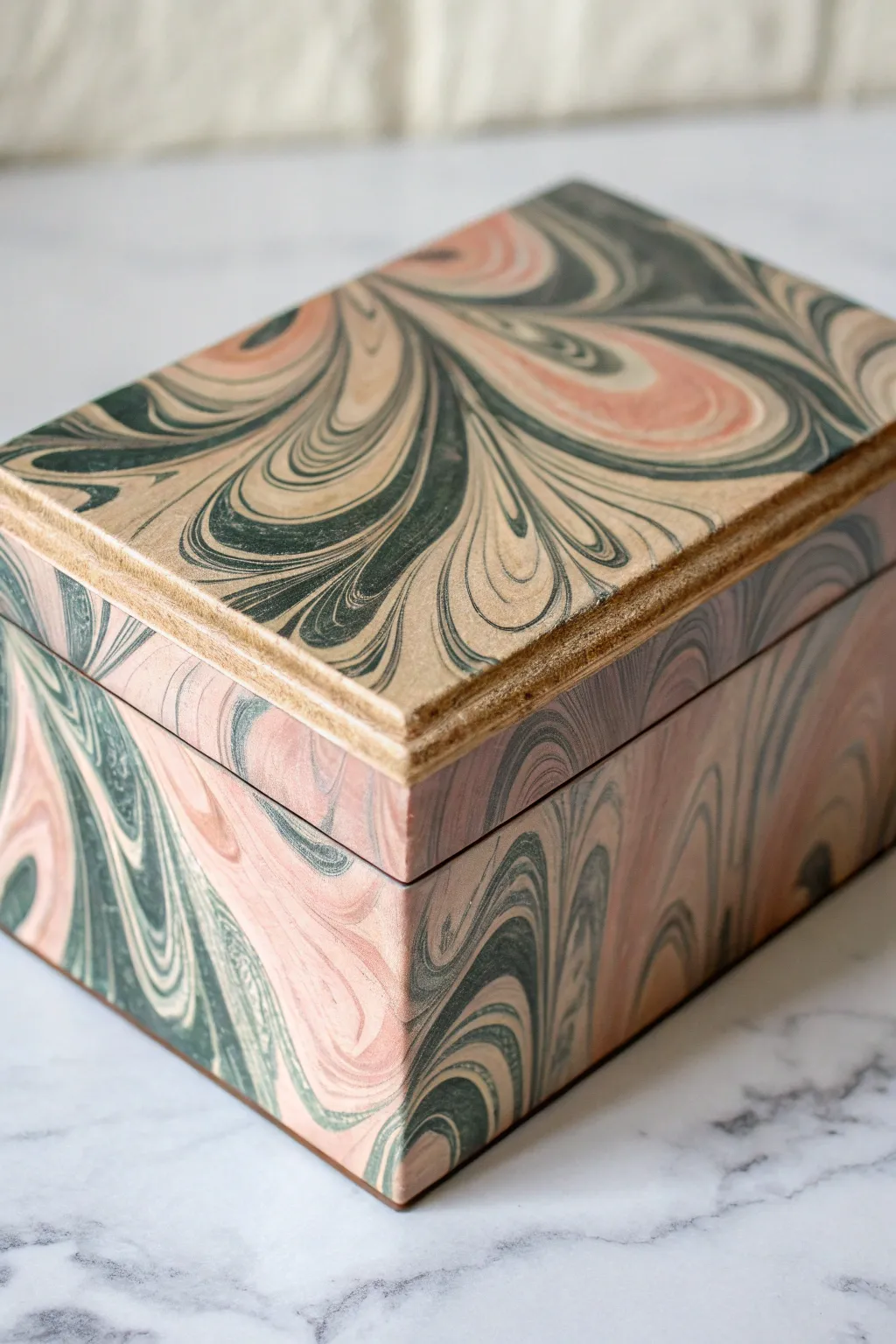 Swirled marbled dip-painted wooden box, minimalist and boho, with DIY tray beside it