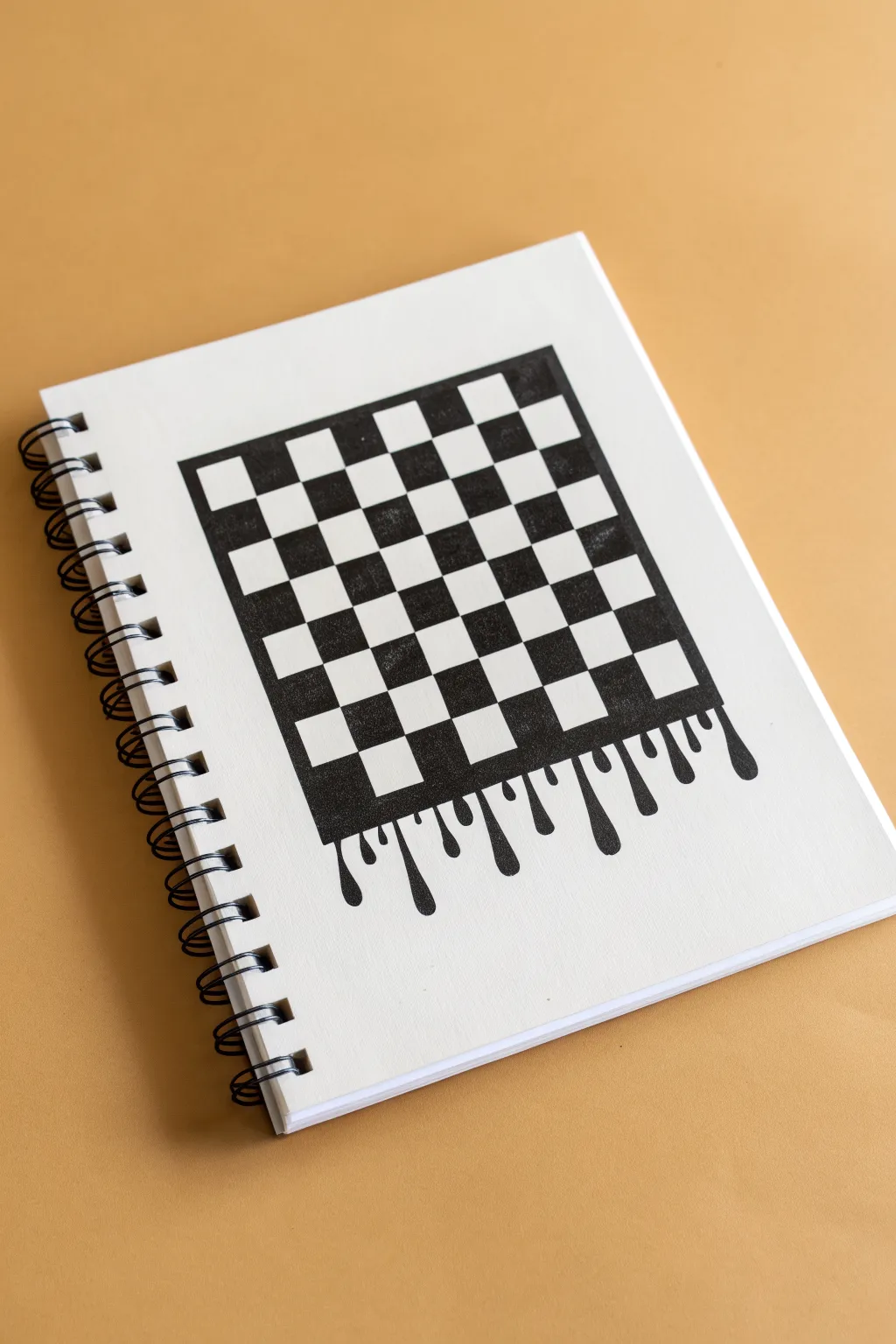 Drippy checkerboard fade: bold black squares melting into clean, intentional drips on white.