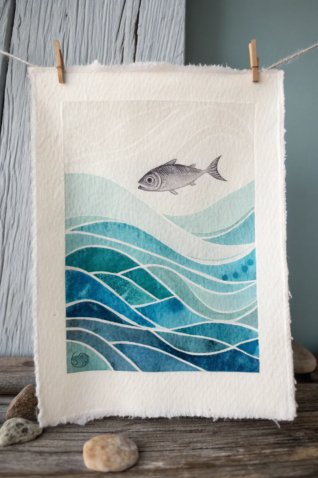 Minimalist negative space fish revealed by calm watercolor ripples in soft Scandinavian blues