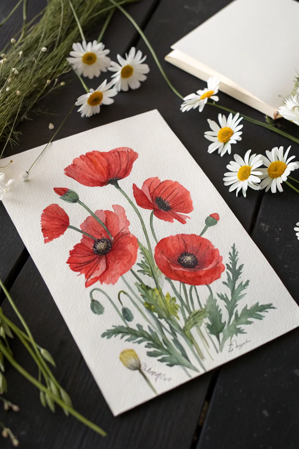 Poppies on matte black: a minimalist floral painting idea with instant, dramatic contrast.