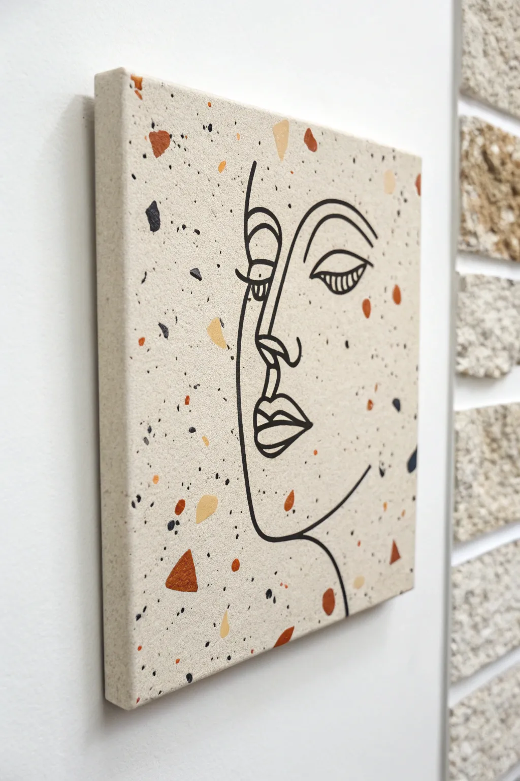 Bold line art face floating over a soft terrazzo field, minimal yet playful and feminine.