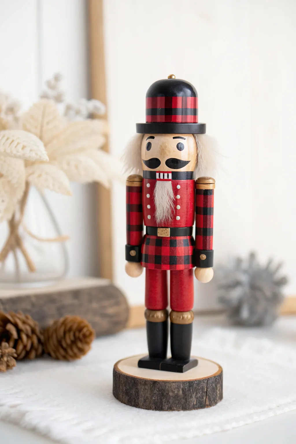 A classic red and black buffalo check adds a cozy preppy touch to this DIY nutcracker.