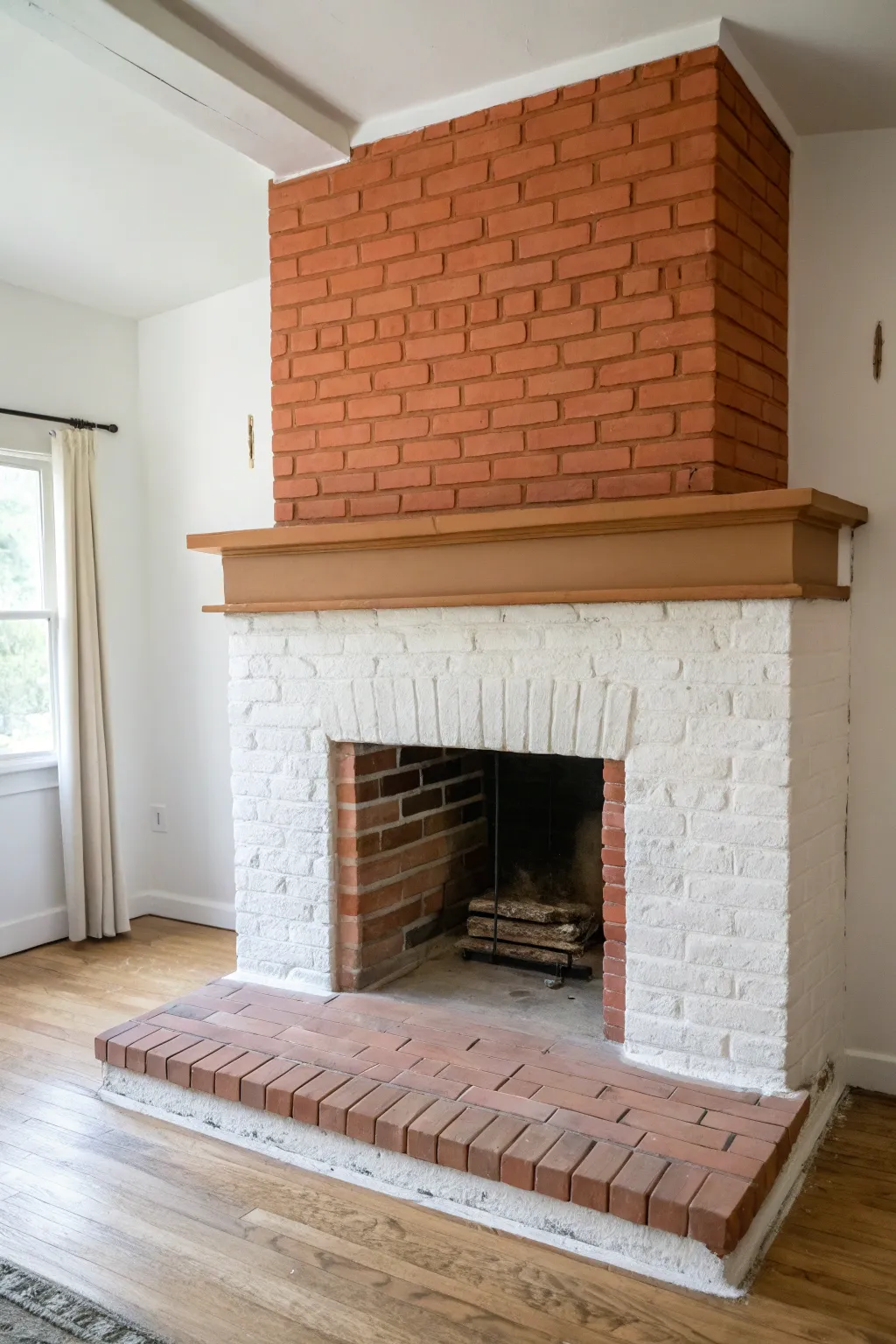 Two-tone painted brick fireplace with a crisp color break for a calm Scandinavian boho vibe