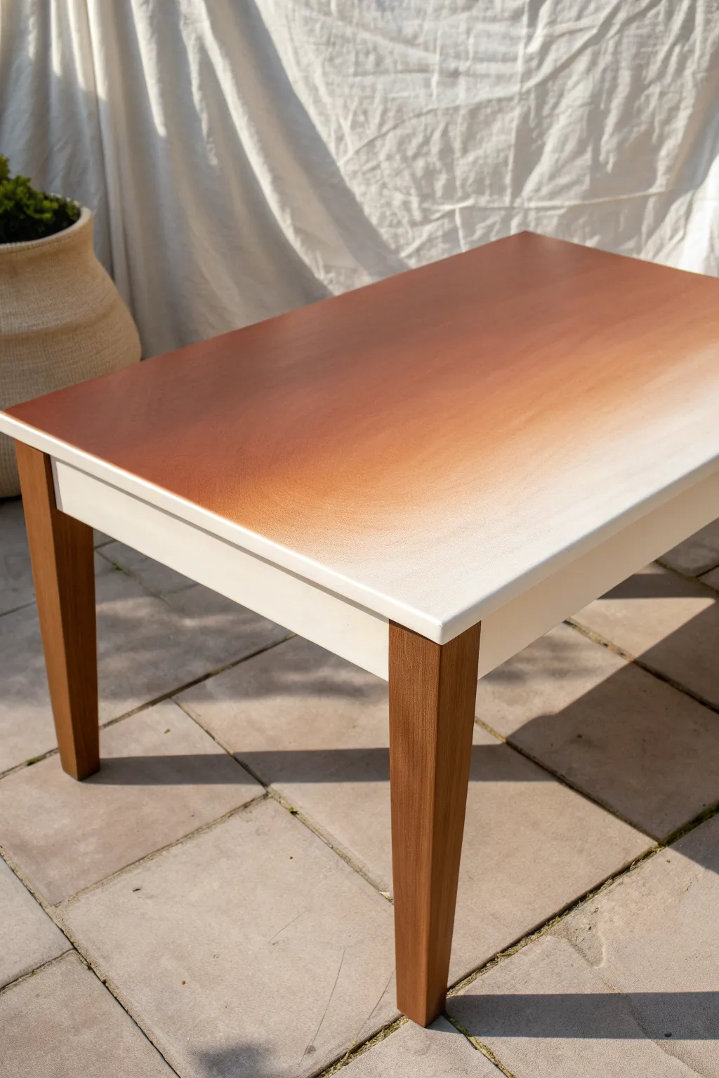 Soft ombre paint fade turns a simple coffee table into a calm Scandinavian-boho statement.