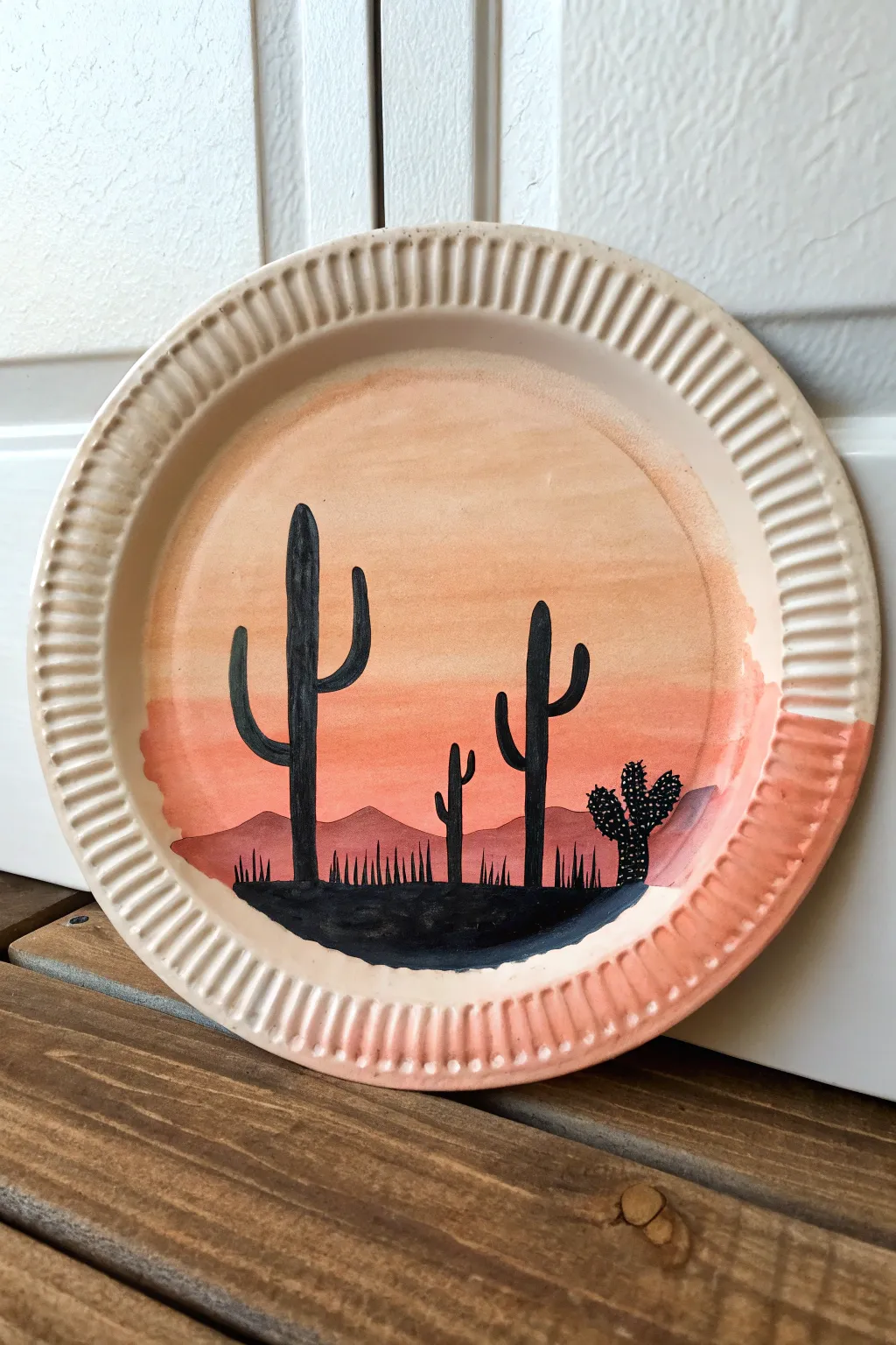 Desert sunset cactus paper plate painting that looks like minimalist mini wall art