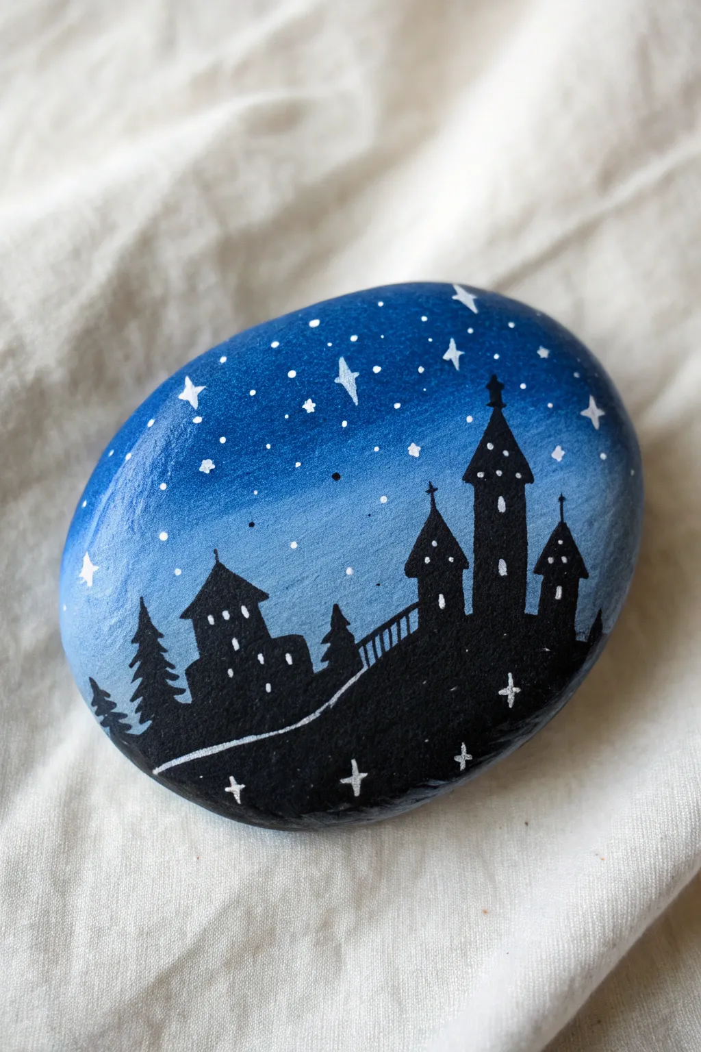 Castle silhouette rock painting under a dreamy starry gradient, minimal Nordic boho vibe