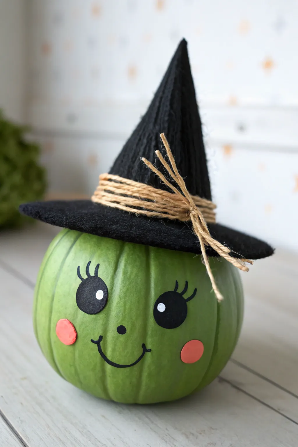 Cute witch hat mini pumpkin character, a simple cozy fall painting idea for beginners.