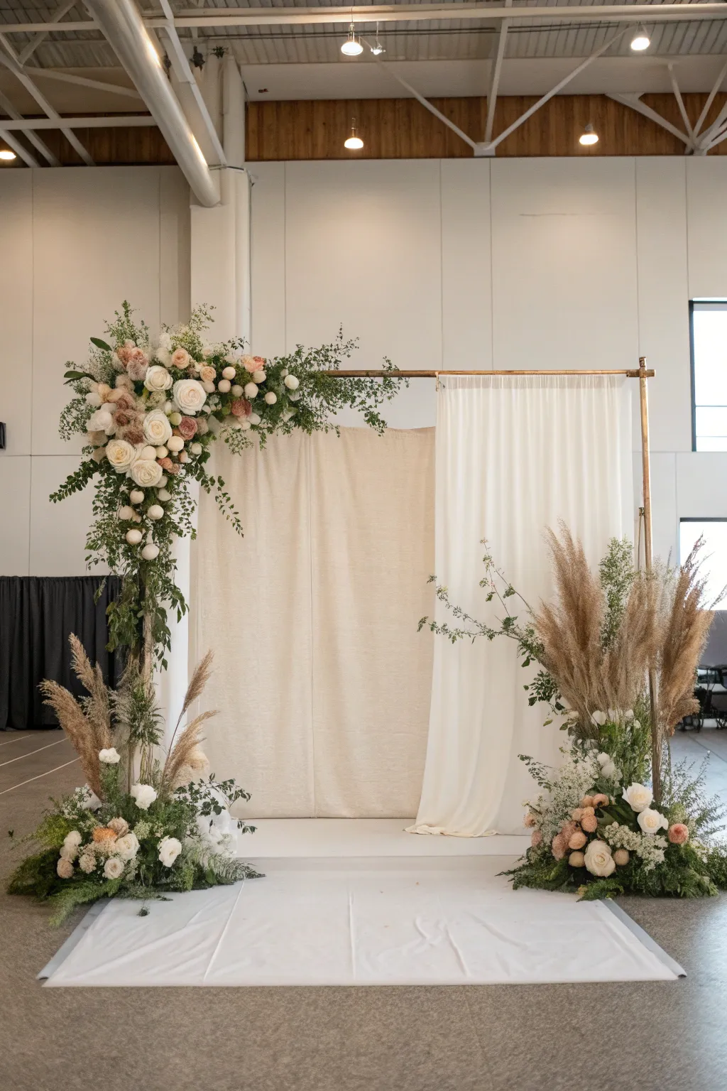 Floral corner clusters with a low ground border create a soft frame while the center stays clean.