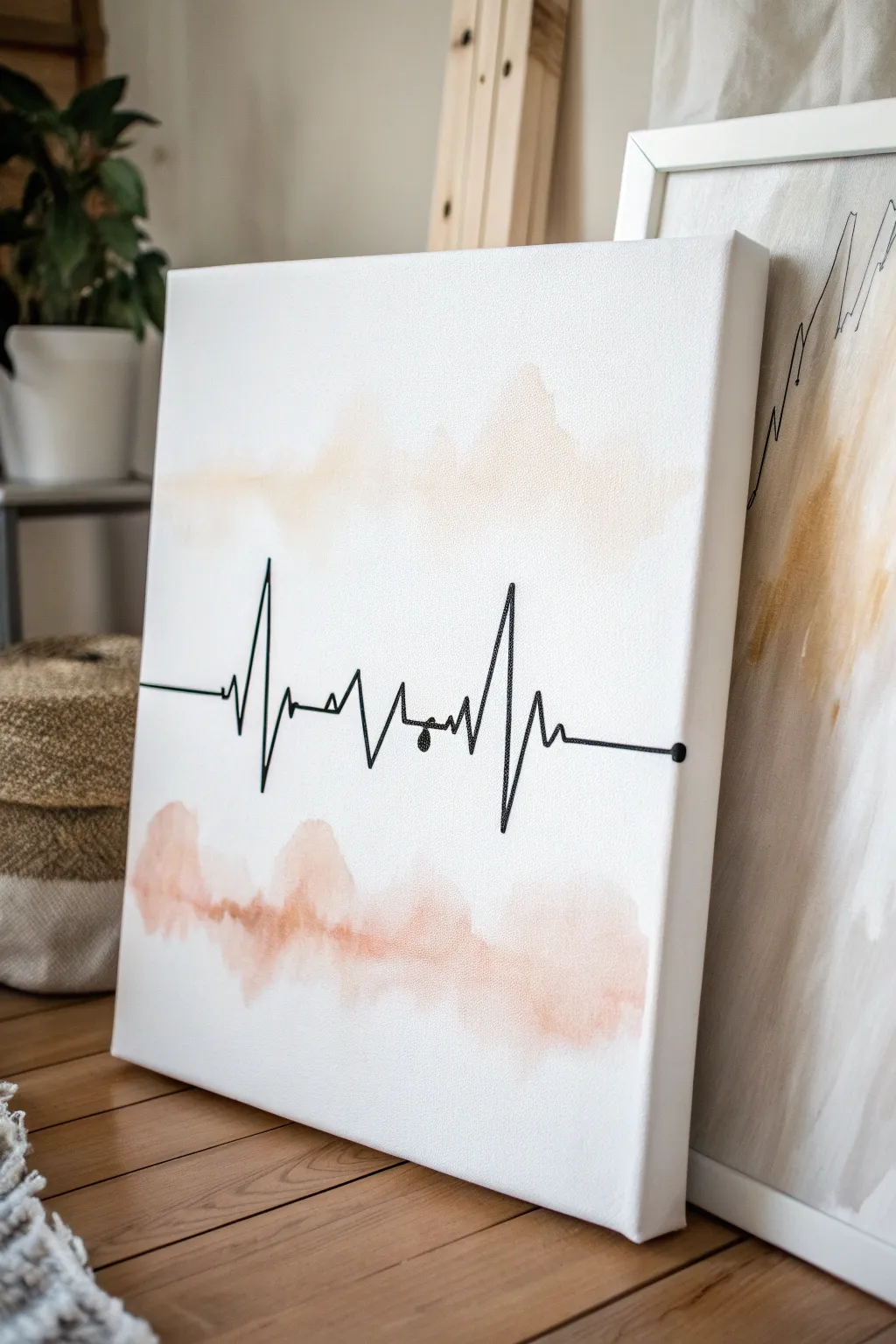 Minimal heartbeat wave keepsake painting idea for a modern baby shower nursery memory.