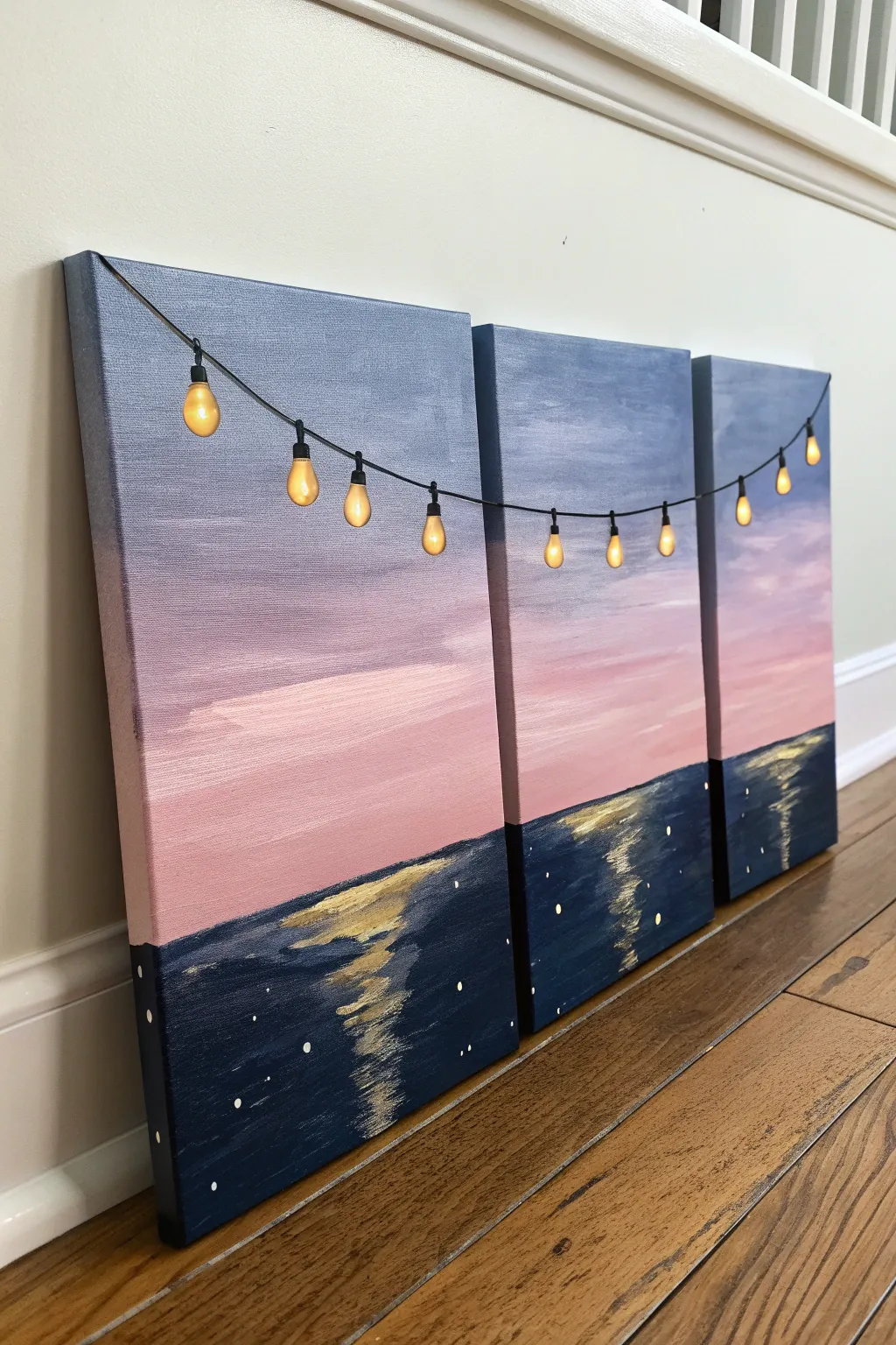 Beginner-friendly triptych canvas: twilight gradient and warm string lights, minimalist and cozy.